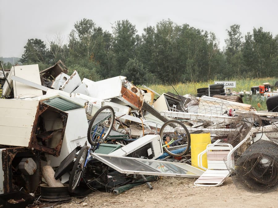 Illegally dumped appliances in a Central Valley field — where uncollected units too often end up
