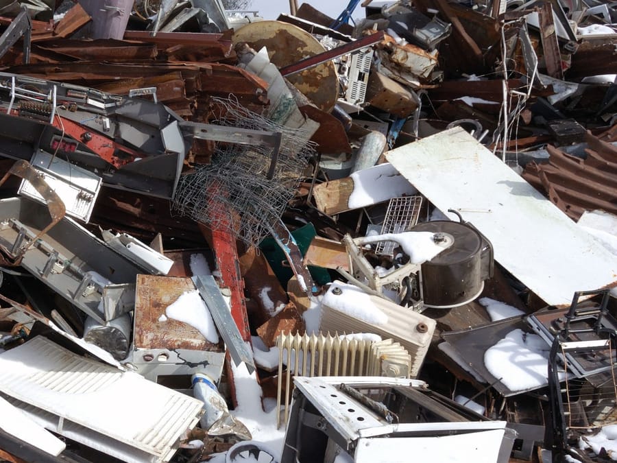 Mixed load of scrap, timber and old appliances of the kind cleared from Madera, CA properties