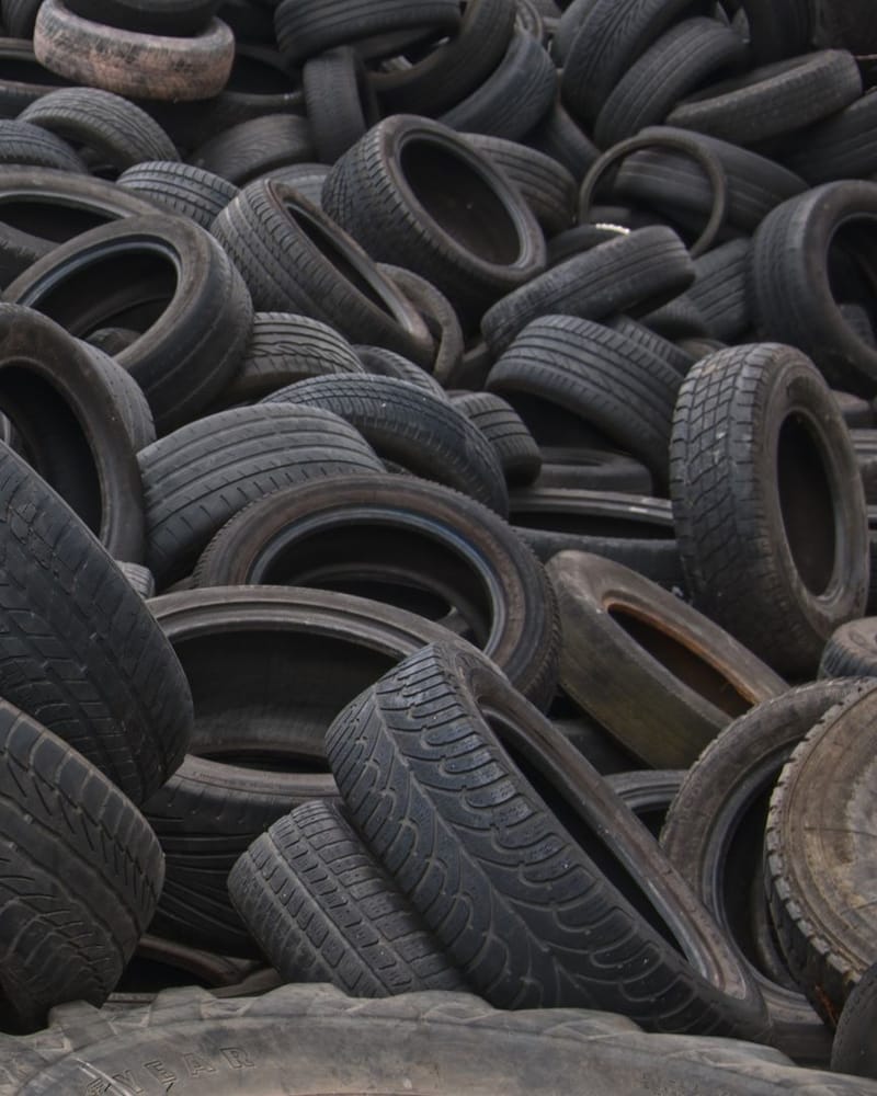 Stack of used tires collected for specialised disposal in Fresno, California